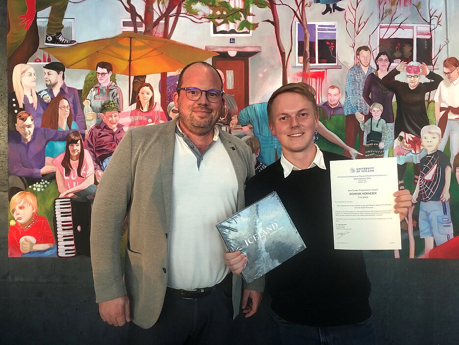 Dominik Horneber (right) presenting his First Place Certificate for his poster and his supervisor Prof. Dr. Sebastian Klembt (left). Dominik Horneber (right) presenting his First Place Certificate for his poster and his supervisor Prof. Dr. Sebastian Klembt (left).